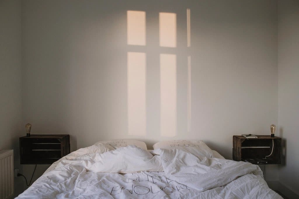 A calm, light-filled Eleganza-styled bedroom